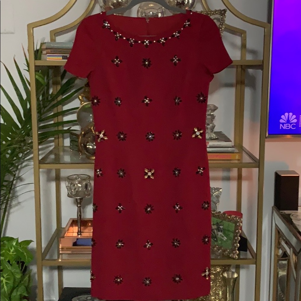 Beautiful dress with  gems sewn on